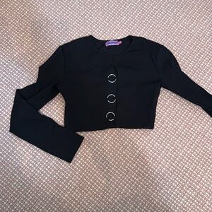 Black long sleeve going out shirt
Open in front between the rings
Edited